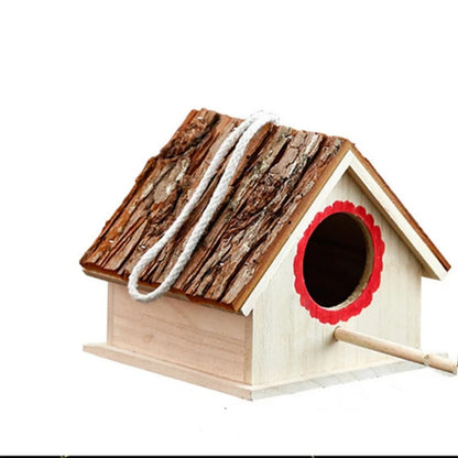 Wooden bird house with bark roof