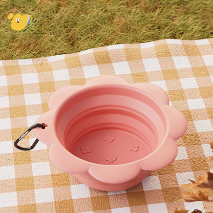 Pink collapsible travel bowl, open