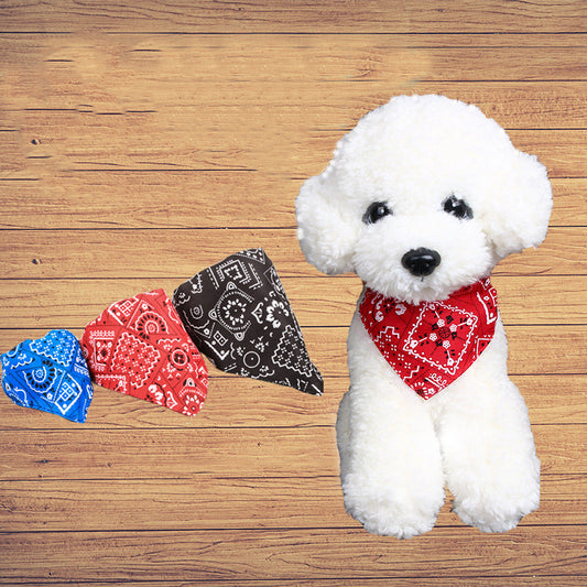 Small dog wearing a red bandana collar