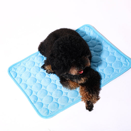 Pet relaxing on a cooling mat