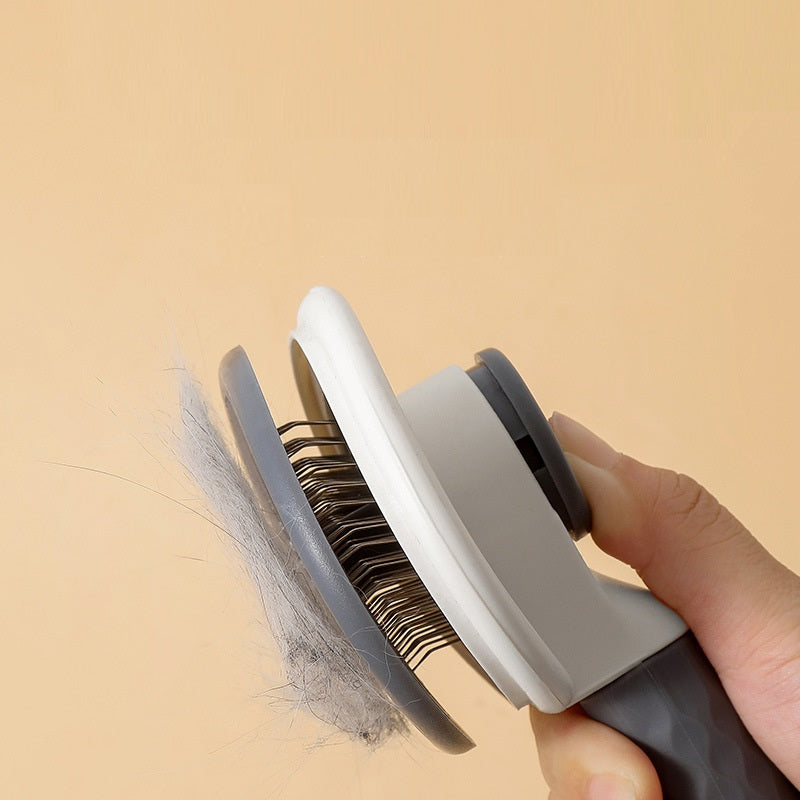 Pushing the back of the brush to release collected hair